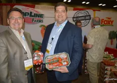 Ken Green and Dino DiLaudo with Westmoreland-TopLine Farms showing tomatoes of the company's organic line.