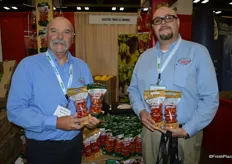 Dino Lacovino and Luis Lopez with Master’s Touch, showing the new packaging for organic and conventional grape tomatoes.