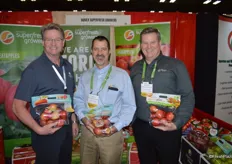 Dan Harrington, Jeff Ritts and David Roby with Domex Superfresh Growers, showing pouch bags with different apple varieties. Jeff shows the latest product: organic apples in pouch.