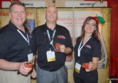 Michael Prather, Bradley Corlew and Rachel Evans with Handy Candy, proudly showing tomato cups.