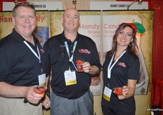 Michael Prather, Bradley Corlew and Rachel Evans with Handy Candy, proudly showing tomato cups.
