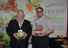Rob Medcalf and Nick Allen with Mucci Farms proudly show the company’s Naked Leaf Lettuce and Cherto tomatoes.