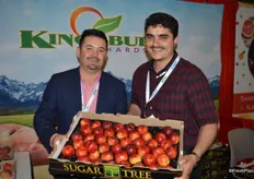 Jose Herrera with Kingsburg Orchards and Adnan Awnallah with Cali Fresh Produce proudly show California's first harvest of stone fruit for this season.