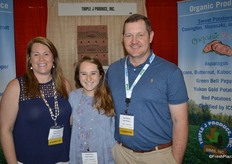 Kristi Hocutt, daughter Tristian and Joey Hocutt with Triple J Produce.