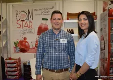 Ms. Helen with Agriculturist Dimitrios Toutzaris of Rodi Hellas; they offer fresh pomegranates, juices and jams.