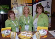 Jessica Brady, Jennifer Armen and Jeanette de-Coninck- Hertzler with Okanagan Specialty Fruits. On display are sliced are sliced Arctic apples as well as the new packaging for them.