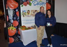 Vince Ferrante and Leslie Simmons with Dave’s Specialty Imports. Leslie is in blueberry style, showing a clamshell of blueberries and wearing blueberry shoes.
