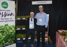 Ian Adamson and Michael Curry with Greenbelt Microgreens proudly stand in front of the microgreens display.