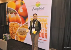 Gabriela Vallejo from Ecuafields promoting yellow passion fruit and dragon fruit