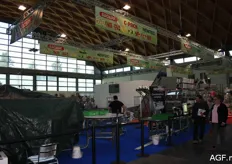 The stand of Newtec with various machines.