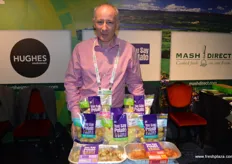 Lewis Cunningham at the Wilson's Country stand with a new additions the range - baby potatoes in garlic and herb butter and sweet potato chips.