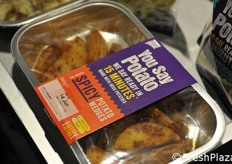 Baking trays with potatoes ready to cook.