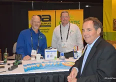 Catalytic Generators and sister company QA Supplies are represented by Greg Akins and Steve Page. Visiting the booth is Gary Campisi with Walmart.
