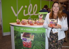 Helen Aquino with Village Farms shows heavenly villagio marzano tomatoes, promoted as Spontaneous Snack Attacks (S.S.A.).