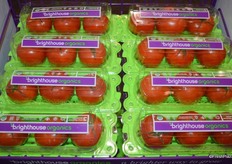 New organic tomatoes from NatureSweet. The packaging resembles a greenhouse.