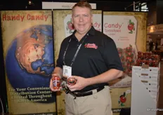 Mike Prather with Handy Candy shows the company's 4 oz. and brand new 2 oz. packaging for grape tomatoes.
