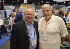 Dan Johnson of Dan Johnson Insights walks the floor with Charlie Eagle of Southern Specialties.