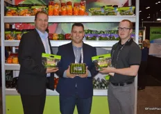 Mario Testani, Justin Henkel and Dean Scott with Lakeside Produce show new packaging for organic cucumbers.