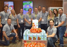A happy team at the Sunset Mastronardi booth. In the front, Maine grown tomatoes from Backyard Farms. Last week, Mastronardi announced the acquisition of Backyard Farms.