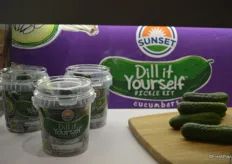 SUNSET® Dill It Yourself™ Pickle Kit. Each pail contains fresh SUNSET® cucumbers and a packet of spice.