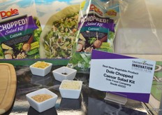 Dole Chopped Caesar Salad Kit features Crispy Quinoa, Crumbled Garlic Bread Croutons, Black Pepper, Parmesan Cheese, Romaine and Dole's Signature Caesar Dressing.
