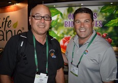 John Janker of Charlie's Produce is talking with Sunset/Mastronardi's Ken Silveira.