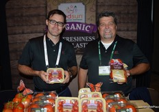 Organic grape tomatoes and organic tomatoes on the vine shown by Kyle Moynahan and Ray Mason with RedSun Farms.