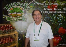 Levon Ganajian of Trinity Fruit has organic stone fruit on display, which is in peak season right now.