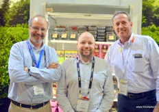 Felipe Juillerat, David Smith and Dwight Ferguson in front of a selection of Naturipe's fresh berries.
