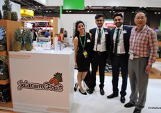 Puja Thakrar, Suraj Thakrar and Jai Thakrar from Jalaram Fruit from Costa rica with their visitor at that moment.
