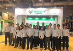 The full team of Riverkin in front of the stand. The company is a large importer of, among other products, cherries into China.