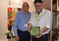 Afrex Trading 2003 PRY supplies mini vegetables and edible flowers. John Kowarsky and Etienne Tartz. Etienne is showing the Ice leaf, a salty, crunchy product.