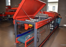 Technicians working on a Sorter machine for an upcoming show.