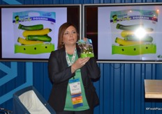 Nicole Brandt shows Robinson Fresh’ baby squash, one of the products of the new baby vegetable line