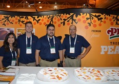Courtney Rodriguez, Denver J. Schutz, Armando Castrejon and Denver Schutz with Gerawan Farming. The company served peaches to show attendees.