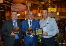 John Mckernan and Chris Lambrou with Sonoco. In the middle Nick Dulcich with Sunlight International. The three gentlemen proudly show a brand new grape package with film as opposed to a plastic lid.