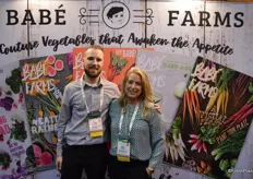 Matt Hiltner and Ande Manos with Babe Farms in front of a new backdrop that provides a brief overview of the company and its products.