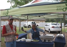 Thys Bloem of Malelane Agri and Mygirl Mokoena at the Halls avocado-and-vetkoek stand.