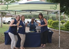 Jacqulene Snyman, Candice van Veijeren and Nelene Kleynhans of Westfalia eating Halls avocados. Mygirl Mokoena is behind the table.