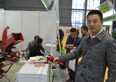 Jia Meng Yun showing one of the products