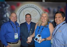 John Heffernan, Joe Dugo, Jill Overdorf and Rodrigo Torres proudly show the Joe Nucci award that Naturipe Farms won for its snack line. This is an annual innovation award, named after Joe Nucci.