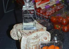 Close-up of the finalist award and lorabella tomatoes.