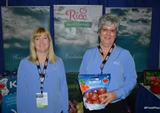 Jill Hughey and Brenda Briggs with Rice Fruit Company. Brenda shows Kiku apples, grown in Pennsylvania.