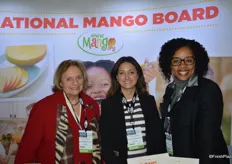 Smiles in the booth of the National Mango Board. From left to right: Cece Krumrine, Angela Serna and Valda Coryat.