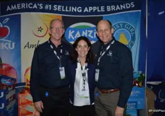 Tim Welsh, Danelle Huber and George Harter with CMI Orchards.