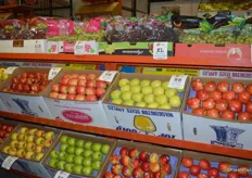 Apples and grapes are labeled with the name of the variety as well as the grower-shipper.