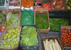 John Vena, Inc. carries everything...from mainstream produce to more rare and exotic items. Cactus leaves right next to pears. Above the pears is a box with tindora, which is in high demand by Indians.