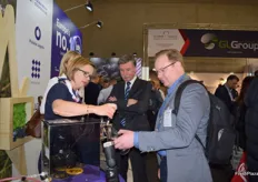 Dominika from the Polish Berry Cooperative, pouring a white beer made from Polish blueberries. Pictured in the middle is Witold Boguta from the Polish Fruit and Vegetable Producer Association.