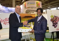 Willem Bestbier, SATI CEO handing over the box of Joybells to Luke Govendor from South Africa’s Department of Trade and Industry (DTI).