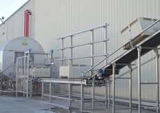Bins that have been used in the citrus groves are washed and sanitized prior to being used again.